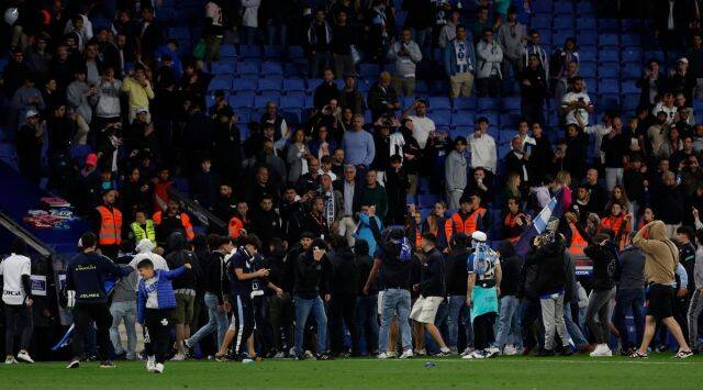 Watch: Early end to Barcelona’s title celebrations after Espanyol fans invade pitch3