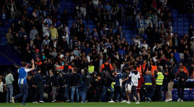 Watch: Early end to Barcelona’s title celebrations after Espanyol fans invade pitch13